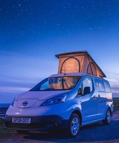 An electric campervan, the sleeping pod up in the roof