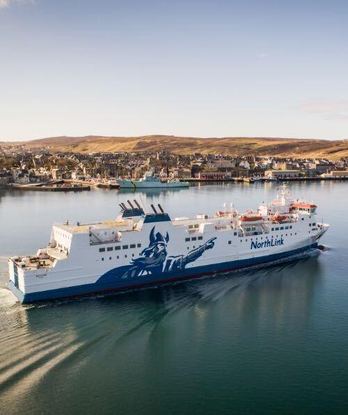The Northlink ferry on a sunny day sailing into Lerwick