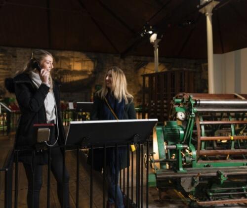Two visitors explore the exhibits at Verdant Works, a restored mill complex with interactive exhibits which tell the story of local 19th and 20th century jute production in Dundee